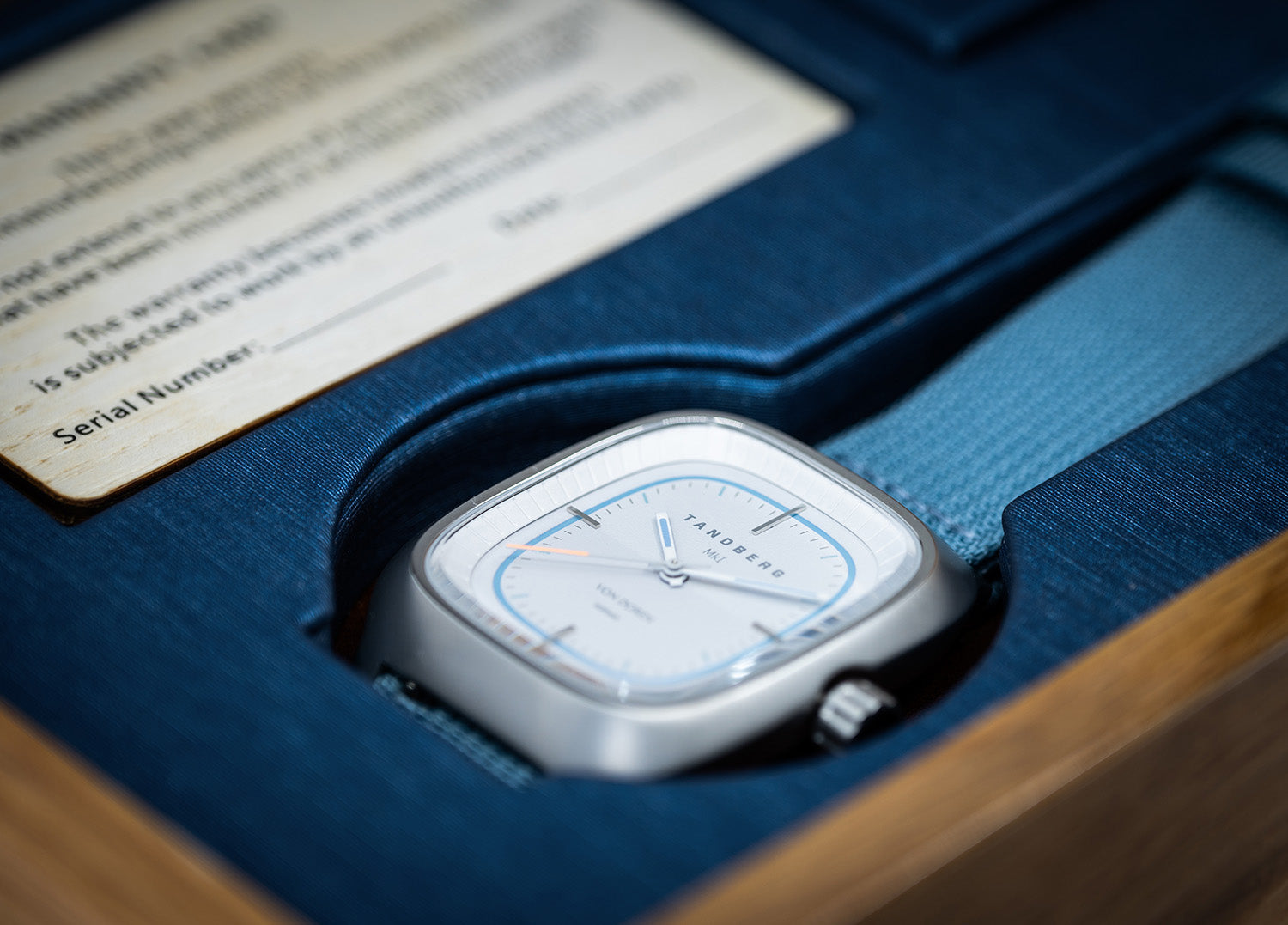 Von Doren Tandberg displayed in a custom blue box with a matching blue strap and certificate in the background.
